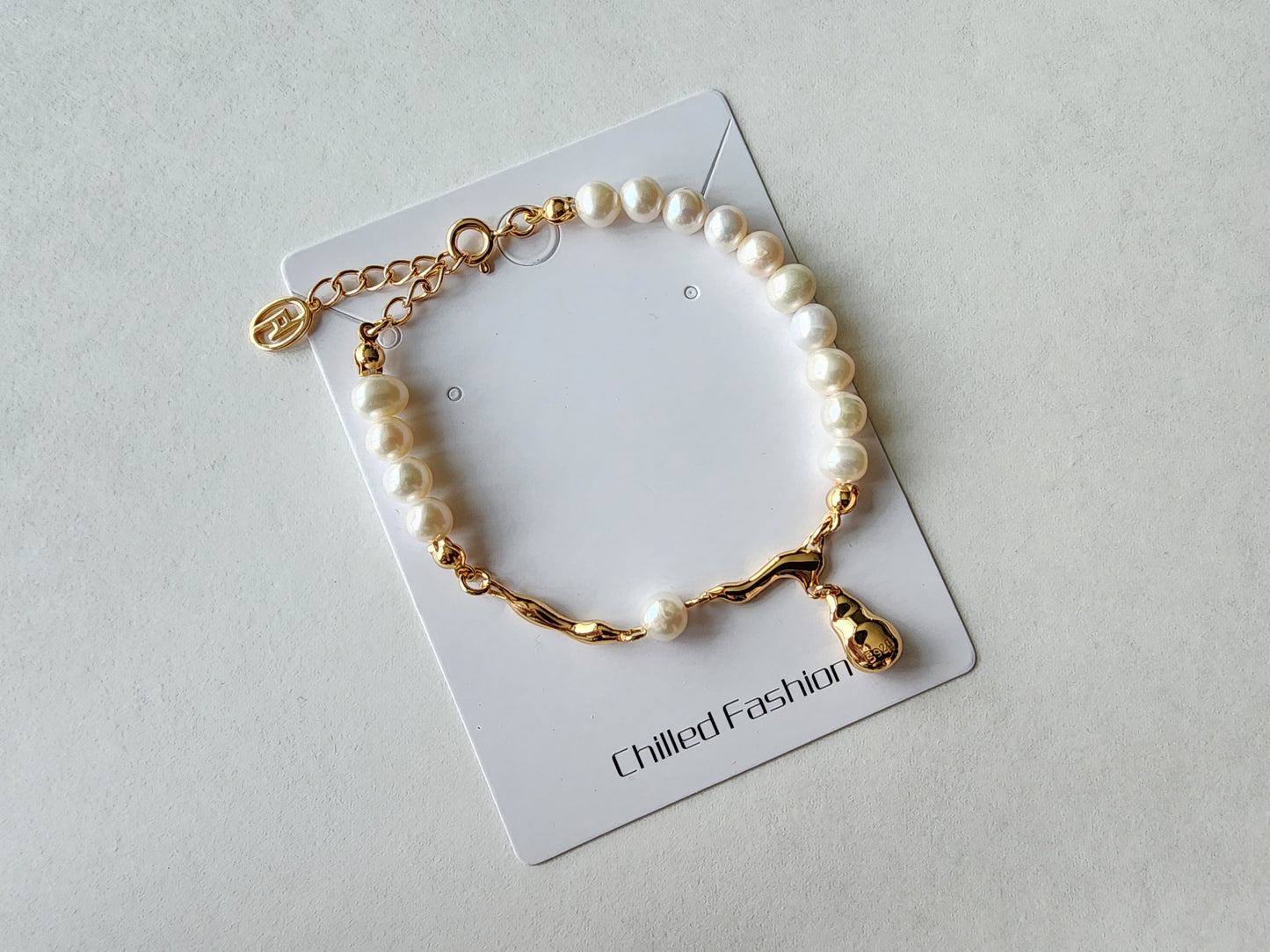 [Bracelet] Elegant Sterling Silver and Freshwater Pearl Bracelet with Unique Charm