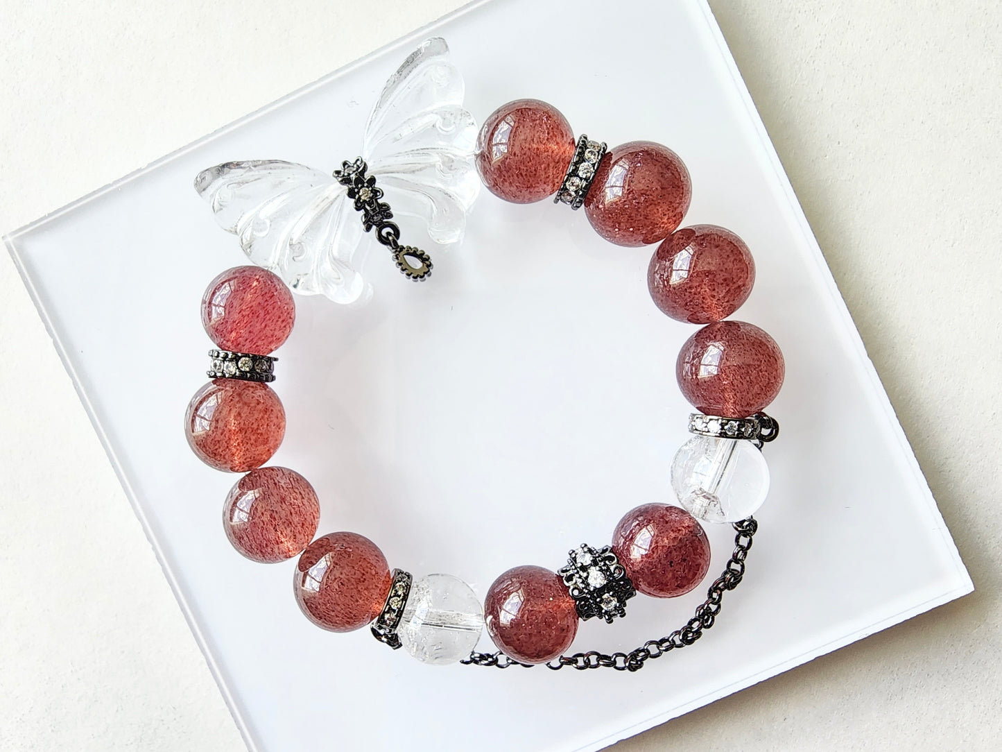 [Bracelet] 12mm Strawberry Quartz and Clear Quartz Bracelet with Carved Butterfly Wings