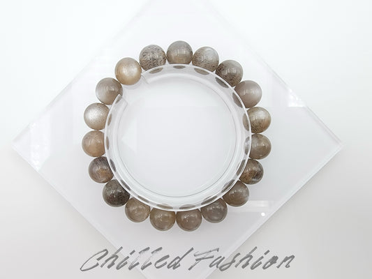 [Bracelet] Grounded in Strength: 10mm Black Gold Skeletal Sunstone Round Bead Bracelet