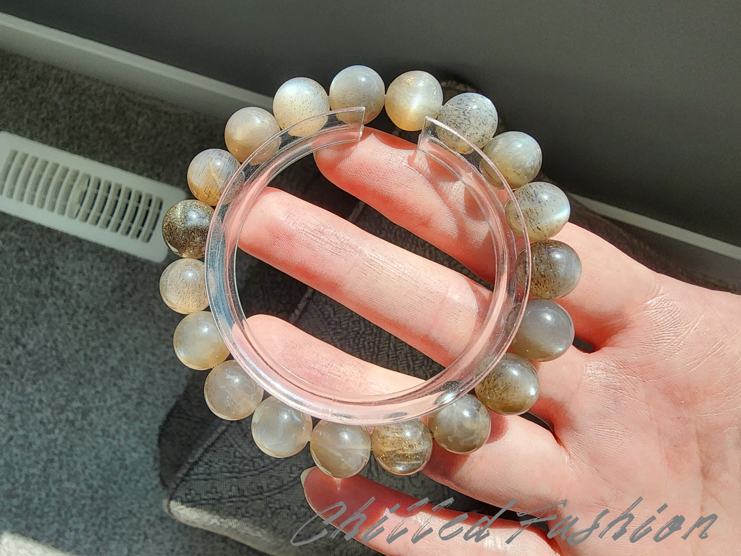 [Bracelet] Grounded in Strength: 10mm Black Gold Skeletal Sunstone Round Bead Bracelet